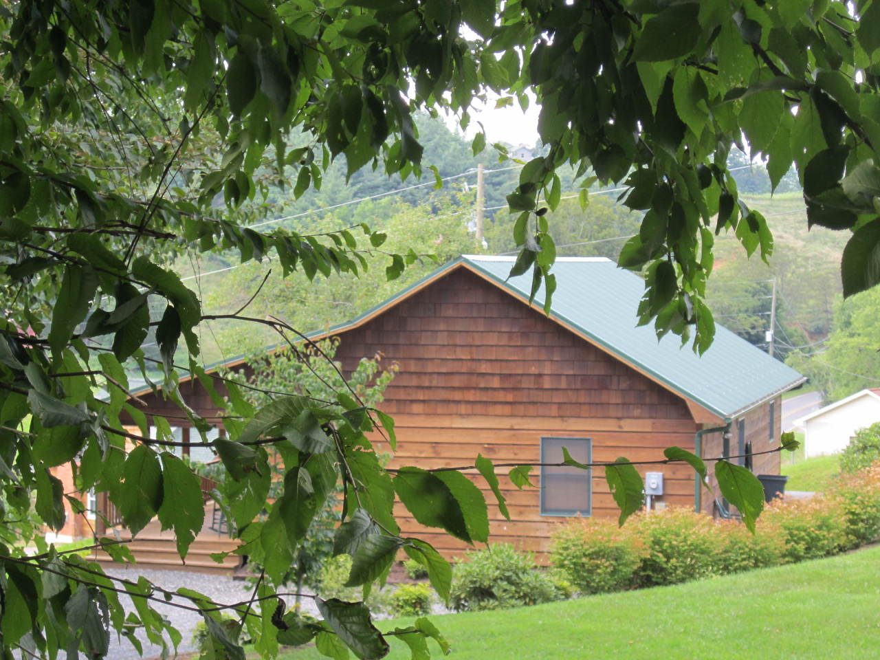 A cabin seen through the trees
